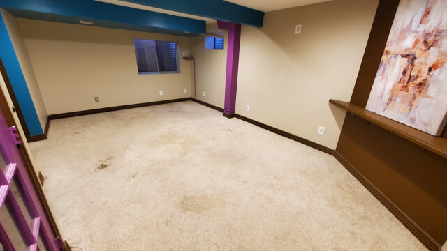 Wide view of the basement room during the remodel.