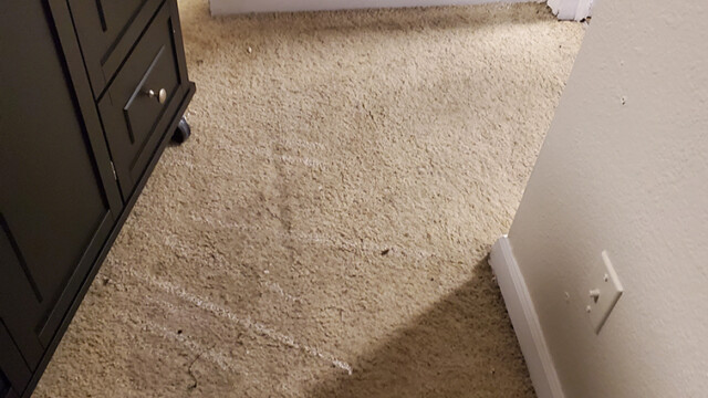 Flooring at the basement entry.