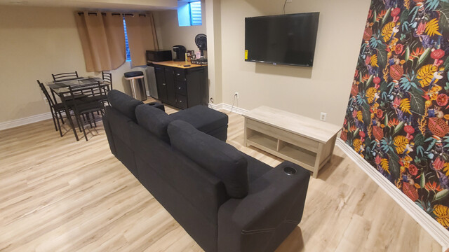 Furnished basement room after the remodel.