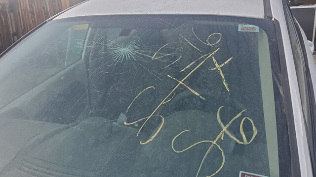 Damaged glass visible before the work.
