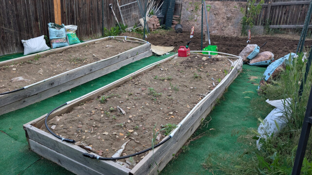 Raised garden bed and ground area during the irrigation project.
