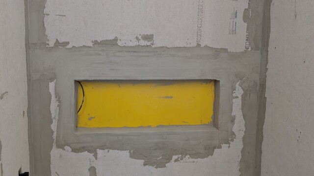Shower niche and wall board before finishing.